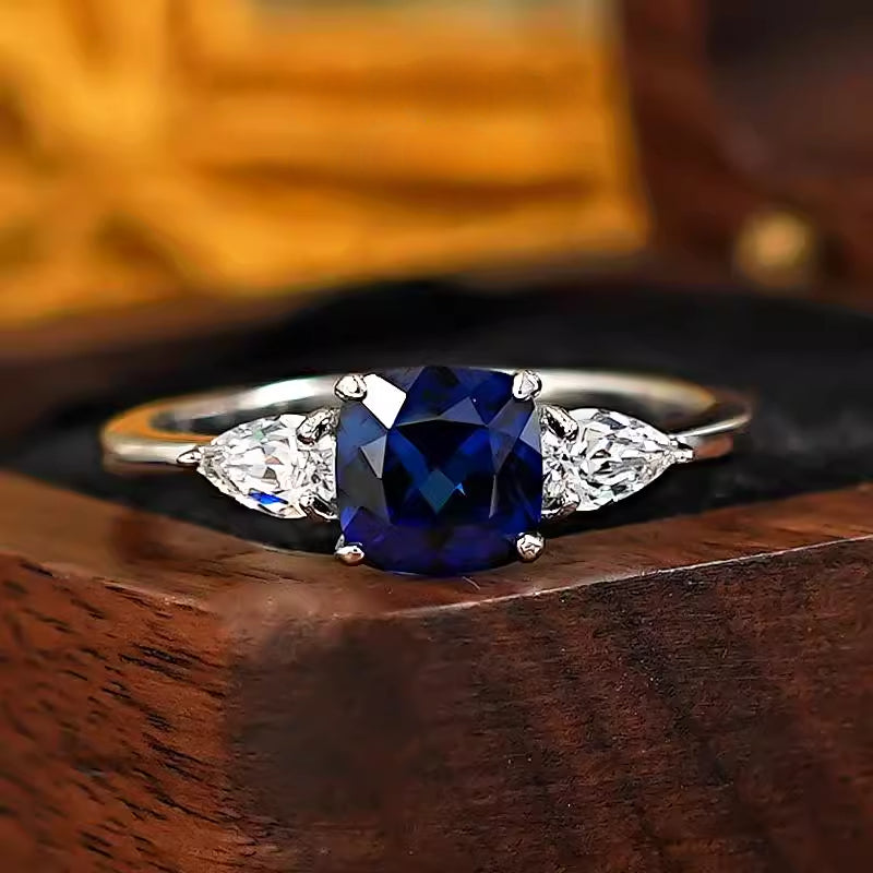 Three Stone Blue Cushion Cut Sterling Silver Ring Carly Jewelry